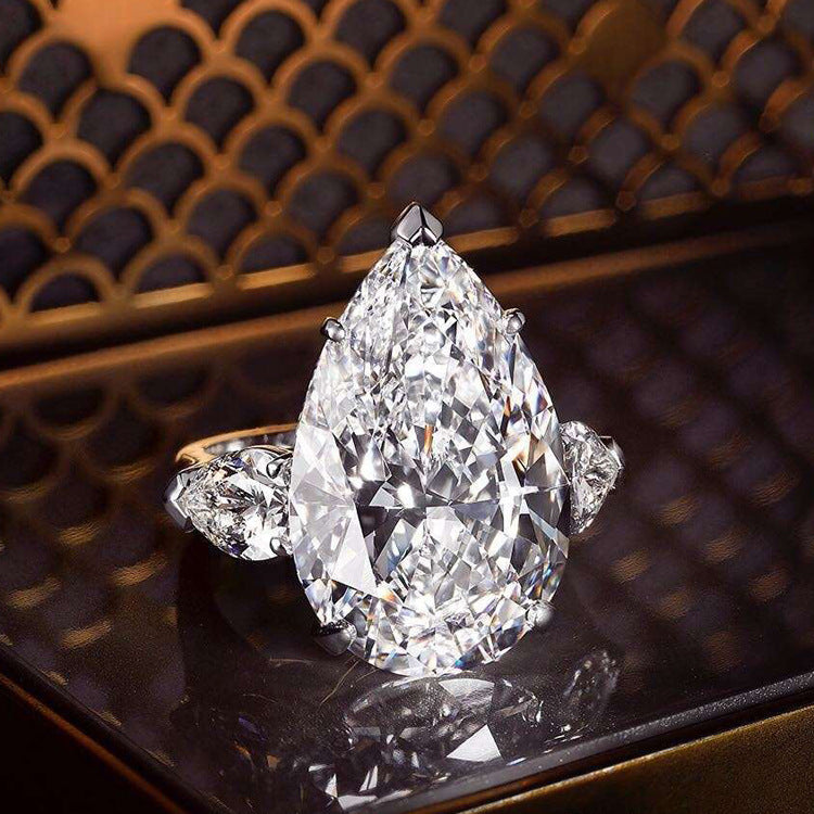 Engagement drop pear-shaped ring